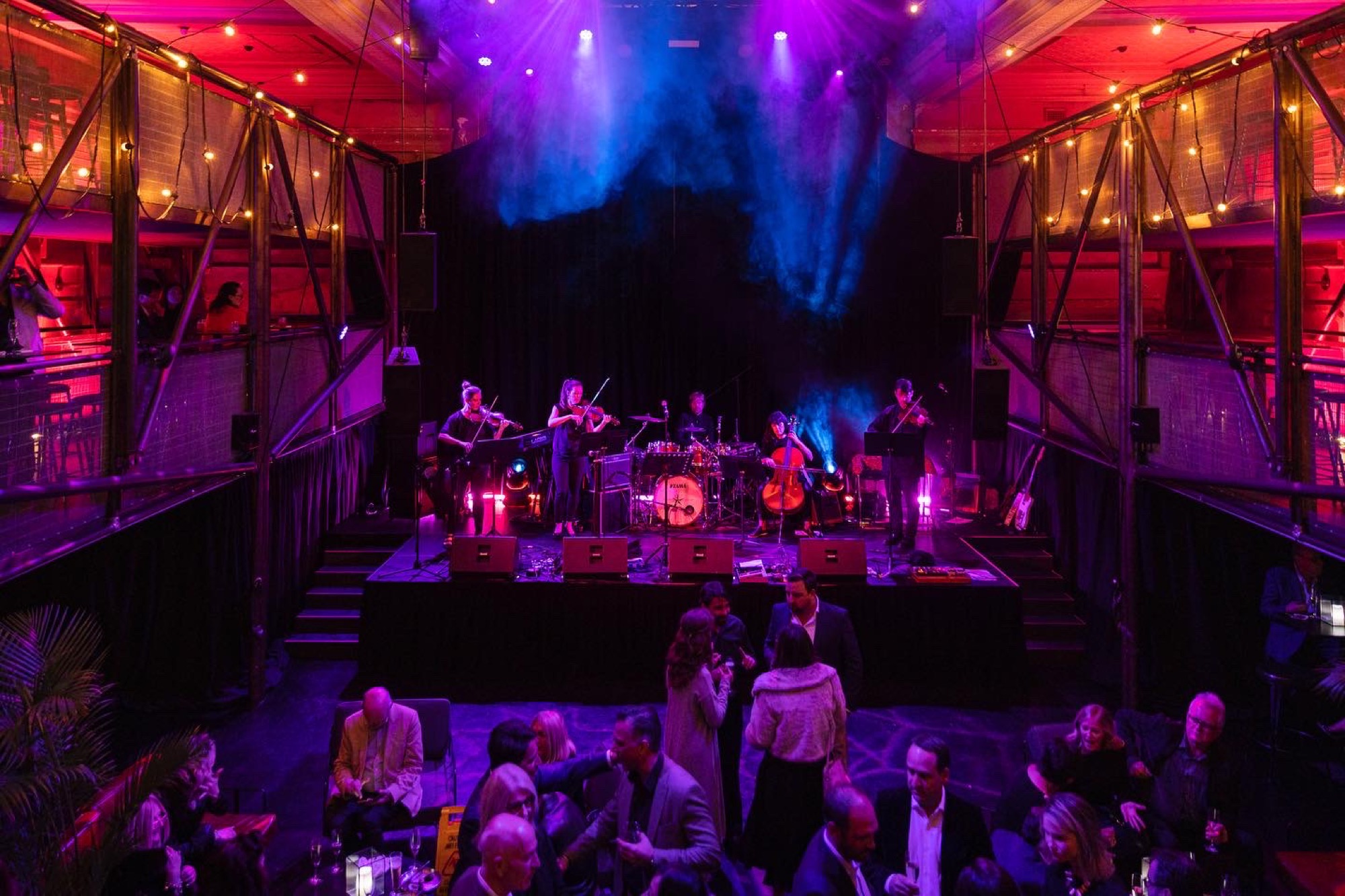 Aquila playing a lit venue